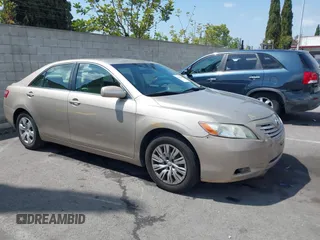 2007 Toyota Camry CE with VIN 4T1BE46KX7U716414, listed as a IAAI auction lot 42116250 with 104,298 mi miles and . Bid and sale history available at DreamBid. Image 1.
