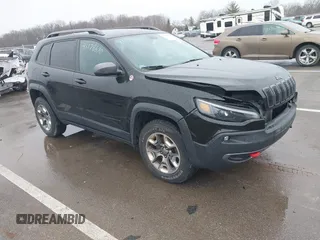 2019 Jeep Cherokee Trailhawk Elite with VIN 1C4PJMBX6KD418409, listed as a IAAI auction lot 41178690 with 80,755 mi miles. Bid and sale history available at carsss.com. Image 1.