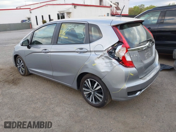 2018 Honda Fit EX-L with VIN 3HGGK5H97JM705564, listed as a IAAI auction lot 42064209 with 43,744 mi miles. Bid and sale history available at carsss.com. Image 3.