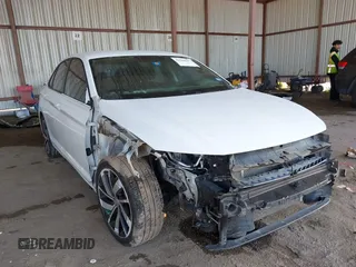 2020 Volkswagen Jetta GLI S z VIN 3VW6T7BU2LM025250, wystawiony jako IAAI lot #41969637 z przebiegiem 38 670 mil mil oraz . Historia ofert i sprzedaży dostępna na DreamBid. Obrazek 1.