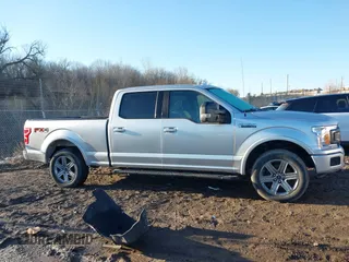 2018 Ford F-150 XL with VIN 1FTFW1EG0JFB44991, listed as a IAAI auction lot 41751140 with 153,051 mi miles. Bid and sale history available at carsss.com. Image 13.