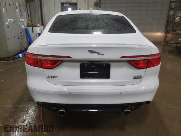 2016 Jaguar XF with VIN SAJBL4BV5GCY00349, listed as a Copart auction lot 83692684 with 71,741 mi miles and Salvage Title. Bid and sale history available at DreamBid. Image 6.