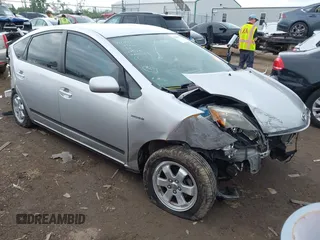 2009 Toyota Prius z VIN JTDKB20U393518407, wystawiony jako IAAI lot #42265807 z przebiegiem 298 286 mil mil oraz . Historia ofert i sprzedaży dostępna na DreamBid. Obrazek 1.