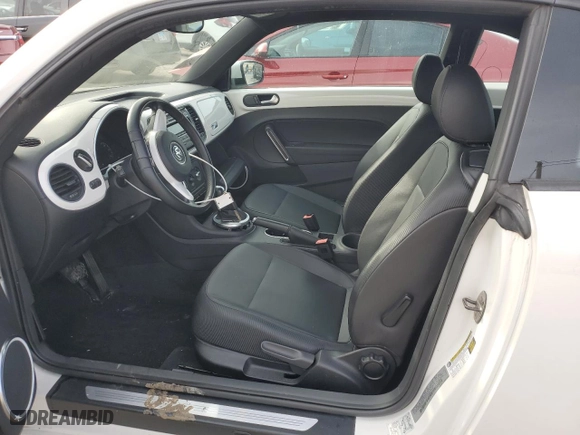 2012 Volkswagen Beetle 2.5L PZEV with VIN 3VWJP7AT6CM605642, listed as a Copart auction lot 80018214 with 101,694 mi miles and Salvage Title. Bid and sale history available at carsss.com. Image 7.