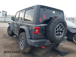 2024 Jeep Wrangler Rubicon with VIN 1C4PJXFG1RW314131, listed as a IAAI auction lot 41472426 with Not provided miles and . Bid and sale history available at DreamBid. Image 3.