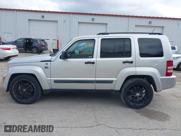 2009 Jeep Liberty Sport with VIN 1J8GN28K39W520228, listed as a IAAI auction lot 41961381 with 196,187 mi miles. Bid and sale history available at carsss.com. Image 15.