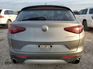 2018 Alfa Romeo Stelvio z VIN ZASFAKAN9J7B88059, wystawiony jako Copart lot #50894085 z przebiegiem 94 280 mil mil oraz Czysty tytuł • Clean title. Historia ofert i sprzedaży dostępna na DreamBid. Obrazek 6.