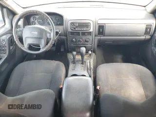 2004 Jeep Grand Cherokee Laredo z VIN 1J4GW48S84C177274, wystawiony jako Copart lot #56468855 z przebiegiem 236 014 mil mil oraz Szkoda całkowita • Salvage title. Historia ofert i sprzedaży dostępna na DreamBid. Obrazek 8.