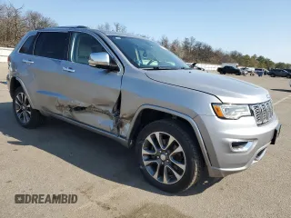 2018 Jeep Grand Cherokee Overland z VIN 1C4RJFCM3JC401399, wystawiony jako Copart lot #53167035 z przebiegiem 87 886 mil mil oraz Nie do naprawy • Non repairable. Historia ofert i sprzedaży dostępna na DreamBid. Obrazek 4.