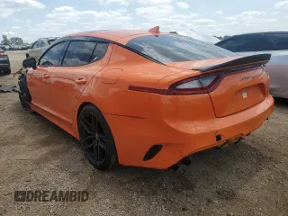 2021 Kia Stinger GT2 with VIN KNAE55LC6M6090748, listed as a Copart auction lot 63906114 with 23,195 mi miles and Salvage Title. Bid and sale history available at carsss.com. Image 2.