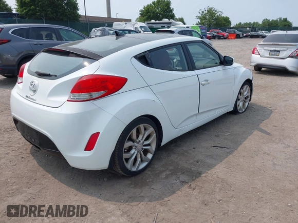 2012 Hyundai Veloster w/Gray Int with VIN KMHTC6AD3CU051395, listed as a IAAI auction lot 42489038 with 153,319 mi miles and . Bid and sale history available at DreamBid. Image 4.