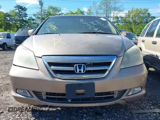 2007 Honda Odyssey Touring z VIN 5FNRL38897B051888, wystawiony jako IAAI lot #42297964 z przebiegiem Nie podano mil oraz . Historia ofert i sprzedaży dostępna na DreamBid. Obrazek 6.