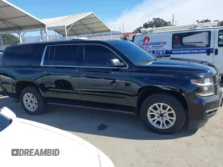 2019 Chevrolet Suburban LT with VIN 1GNSCJKCXKR332739, listed as a IAAI auction lot 41636530 with 104,997 mi miles and . Bid and sale history available at DreamBid. Image 13.