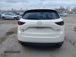 2018 Mazda CX-5 Touring with VIN JM3KFBCMXJ0353369, listed as a IAAI auction lot 41902554 with 154,104 mi miles and . Bid and sale history available at DreamBid. Image 17.