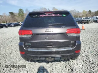 2015 Jeep Grand Cherokee Overland with VIN 1C4RJFCMXFC237723, listed as a Copart auction lot 50318145 with 103,741 mi miles and Salvage title. Bid and sale history available at DreamBid. Image 6.