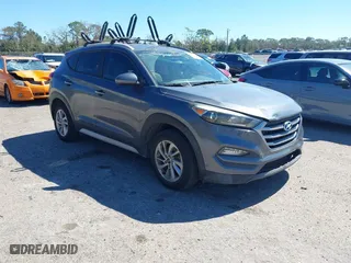 2017 Hyundai Tucson SE Plus with VIN KM8J33A45HU452928, listed as a IAAI auction lot 41601229 with 114,949 mi miles. Bid and sale history available at carsss.com. Image 1.