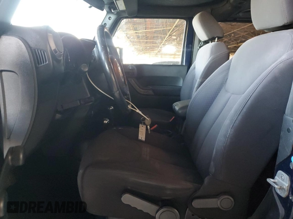 2013 Jeep Wrangler Sport with VIN 1C4GJWAGXDL604850, listed as a Copart auction lot 49509575 with 117,163 mi miles and Salvage Title. Bid and sale history available at carsss.com. Image 7.