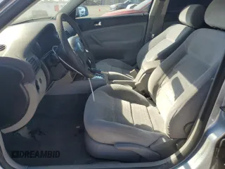2003 Volkswagen Passat GLS z VIN WVWVD63BX3E148318, wystawiony jako Copart lot #74841944 z przebiegiem 86 620 mil mil oraz Szkoda całkowita • Salvage title. Historia ofert i sprzedaży dostępna na DreamBid. Obrazek 7.