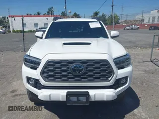 2023 Toyota Tacoma SR5 z VIN 3TMDZ5BN3PM160975, wystawiony jako IAAI lot #42024778 z przebiegiem 41 621 mil mil oraz . Historia ofert i sprzedaży dostępna na DreamBid. Obrazek 11.