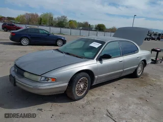 1997 Chrysler LHS with VIN 2C3HC56F9VH782972, listed as a IAAI auction lot 42035696 with 120,301 mi miles. Bid and sale history available at carsss.com. Image 2.