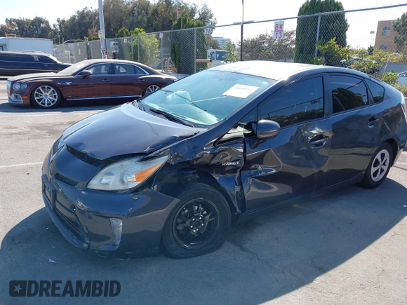 2013 Toyota Prius One with VIN JTDKN3DUXD5661388, listed as a IAAI auction lot 41207260 with 250,530 mi miles and . Bid and sale history available at DreamBid. Image 2.
