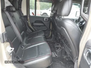 2020 Jeep Gladiator Rubicon z VIN 1C6JJTBG6LL179541, wystawiony jako IAAI lot #42050510 z przebiegiem 52 784 mil mil oraz . Historia ofert i sprzedaży dostępna na DreamBid. Obrazek 8.