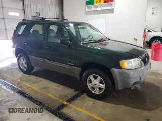 2002 Ford Escape XLS Value with VIN 1FMYU01B32KC48043, listed as a Copart auction lot 63011005 with 167,185 mi miles and Salvage title. Bid and sale history available at DreamBid. Image 4.