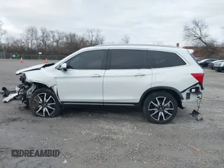2020 Honda Pilot Touring 8-Passenger with VIN 5FNYF6H96LB056229, listed as a IAAI auction lot 41738249 with 65,099 mi miles and . Bid and sale history available at DreamBid. Image 15.