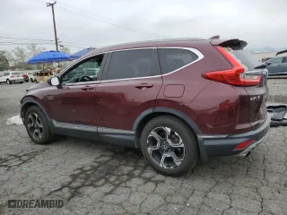 2019 Honda CR-V Touring with VIN 7FARW1H9XKE014219, listed as a Copart auction lot 50588485 with 70,566 mi miles and Salvage Title. Bid and sale history available at carsss.com. Image 2.