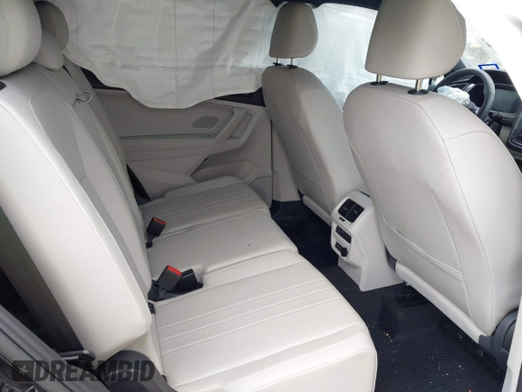 2023 Volkswagen Tiguan SE R-Line Black with VIN 3VVCB7AX0PM122636, listed as a IAAI auction lot 42040494 with 8,589 mi miles and . Bid and sale history available at DreamBid. Image 8.