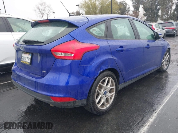 2015 Ford Focus SE with VIN 1FADP3K26FL341512, listed as a IAAI auction lot 41774421 with 107,201 mi miles. Bid and sale history available at carsss.com. Image 4.