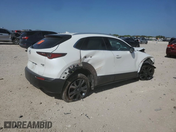 2021 Mazda CX-30 Premium z VIN 3MVDMBDYXMM308490, wystawiony jako Copart lot #49527905 z przebiegiem Nie podano mil oraz Szkoda całkowita • Salvage title. Historia ofert i sprzedaży dostępna na DreamBid. Obrazek 3.
