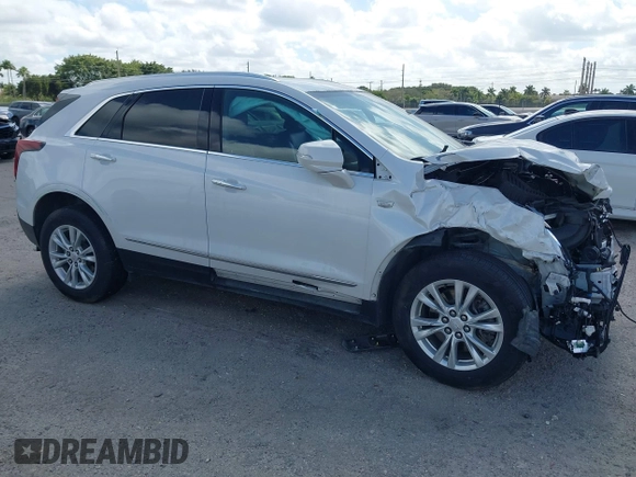 2021 Cadillac XT5 FWD Luxury with VIN 1GYKNAR40MZ146268, listed as a IAAI auction lot 41522802 with 61,775 mi miles. Bid and sale history available at carsss.com. Image 1.