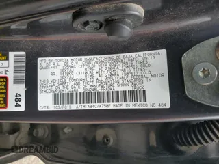 2014 Toyota Tacoma with VIN 3TMLU4EN3EM134468, listed as a Copart auction lot 60686435 with 154,926 mi miles and Salvage title. Bid and sale history available at DreamBid. Image 12.