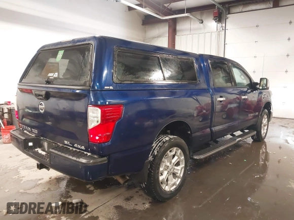 2017 Nissan Titan Pro-4X z VIN 1N6BA1F44HN551551, wystawiony jako IAAI lot #41581877 z przebiegiem 64 834 mil mil oraz . Historia ofert i sprzedaży dostępna na DreamBid. Obrazek 4.