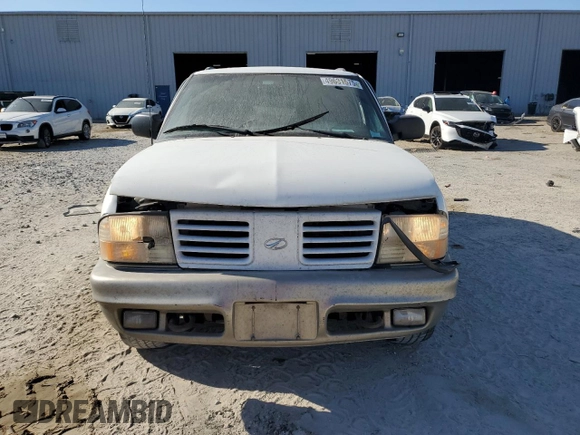 2000 Oldsmobile Bravada z VIN 1GHDT13W8Y2333619, wystawiony jako Copart lot #49631575 z przebiegiem 256 252 mil mil oraz Szkoda całkowita • Salvage title. Historia ofert i sprzedaży dostępna na DreamBid. Obrazek 5.