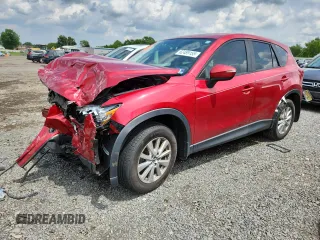 2016 Mazda CX-5 Sport z VIN JM3KE2BY9G0890802, wystawiony jako Copart lot #62489155 z przebiegiem Nie podano mil oraz Szkoda całkowita • Salvage title. Historia ofert i sprzedaży dostępna na DreamBid. Obrazek 1.