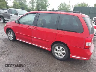 2000 Mazda MPV DX with VIN JM3LW28G1Y0125407, listed as a IAAI auction lot 42386995 with Not provided miles and . Bid and sale history available at DreamBid. Image 3.
