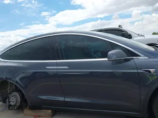 2018 Tesla Model X 75D with VIN 5YJXCBE29JF126629, listed as a IAAI auction lot 42205838 with 47,343 mi miles and . Bid and sale history available at DreamBid. Image 14.