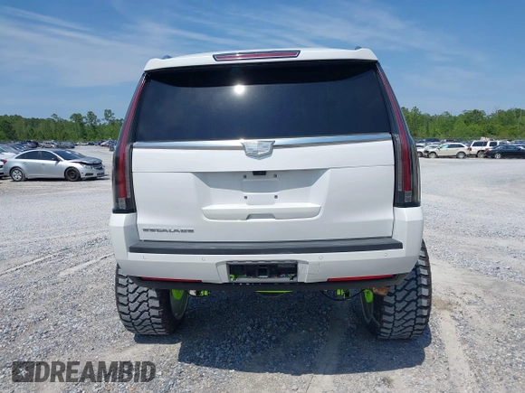 2020 Cadillac Escalade Luxury z VIN 1GYS3BKJ6LR124477, wystawiony jako IAAI lot #42042960 z przebiegiem 42 854 mil mil oraz . Historia ofert i sprzedaży dostępna na DreamBid. Obrazek 16.