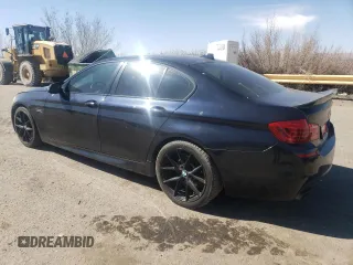 2015 BMW 5 Series 550i with VIN WBAKN9C50FD961489, listed as a Copart auction lot 46683795 with 90,235 mi miles and Salvage title. Bid and sale history available at DreamBid. Image 2.