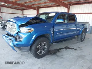 2017 Toyota Tacoma SR5 with VIN 3TMBZ5DN1HM009204, listed as a IAAI auction lot 41301765 with 129,923 mi miles and . Bid and sale history available at DreamBid. Image 17.