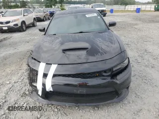 2019 Dodge Charger Scat Pack z VIN 2C3CDXGJ7KH697176, wystawiony jako Copart lot #53702845 z przebiegiem 76 988 mil mil oraz Szkoda całkowita • Salvage title. Historia ofert i sprzedaży dostępna na DreamBid. Obrazek 5.