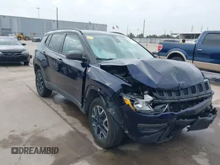 2019 Jeep Compass Trailhawk z VIN 3C4NJDDB8KT619330, wystawiony jako IAAI lot #41237920 z przebiegiem 85 144 mil mil oraz . Historia ofert i sprzedaży dostępna na DreamBid. Obrazek 1.