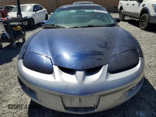 2000 Pontiac Firebird Firebird z VIN 2G2FS22K1Y2160613, wystawiony jako Copart lot #68363214 z przebiegiem 211 139 mil mil oraz Tytuł czysty. Historia ofert i sprzedaży dostępna na DreamBid. Obrazek 5.