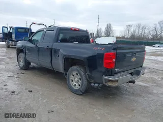 2018 Chevrolet Silverado 1500 LT with VIN 1GCVKREC3JZ323740, listed as a IAAI auction lot 41636517 with 198,422 mi miles. Bid and sale history available at carsss.com. Image 3.