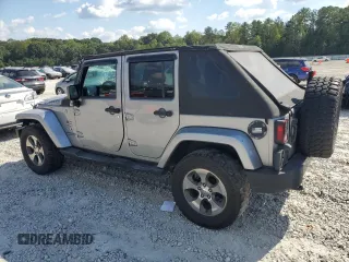 2018 Jeep Wrangler JK Unlimited Sahara with VIN 1C4HJWEG5JL801886, listed as a Copart auction lot 73849454 with 111,016 mi miles and Salvage Title. Bid and sale history available at carsss.com. Image 2.