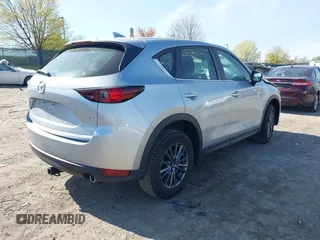 2019 Mazda CX-5 Sport with VIN JM3KFBBM7K0668830, listed as a IAAI auction lot 42069505 with Not Provided miles and . Bid and sale history available at DreamBid. Image 4.