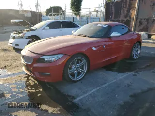 2011 BMW Z4 sDrive35is with VIN WBALM1C54BE393857, listed as a Copart auction lot 72769234 with 88,986 mi miles and Salvage Title. Bid and sale history available at carsss.com. Image 1.