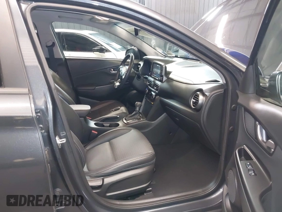 2019 Hyundai Kona Ultimate with VIN KM8K5CA57KU325421, listed as a IAAI auction lot 41369897 with 30,733 mi miles. Bid and sale history available at carsss.com. Image 5.